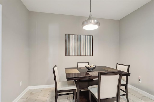 dining room with light tile patterned flooring