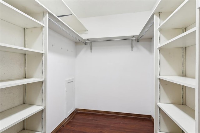 5512 David Dr, Kenner, LA 70065 - spacious closet featuring dark wood-type flooring