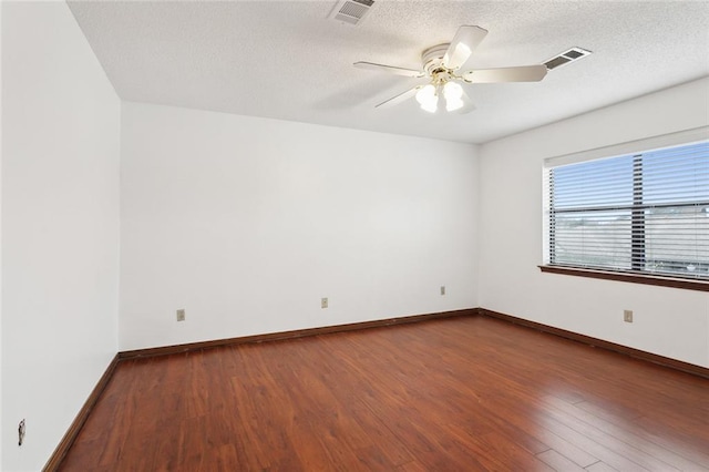 5512 David Dr, Kenner, LA 70065 - unfurnished room with wood finished floors, ceiling fan, and a textured ceiling