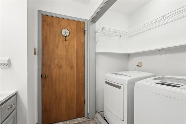 laundry area featuring separate washer and dryer