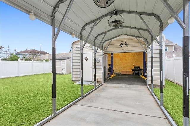 5512 David Dr, Kenner, LA 70065 - view of parking / parking lot featuring a shed, a fenced backyard, and a detached carport