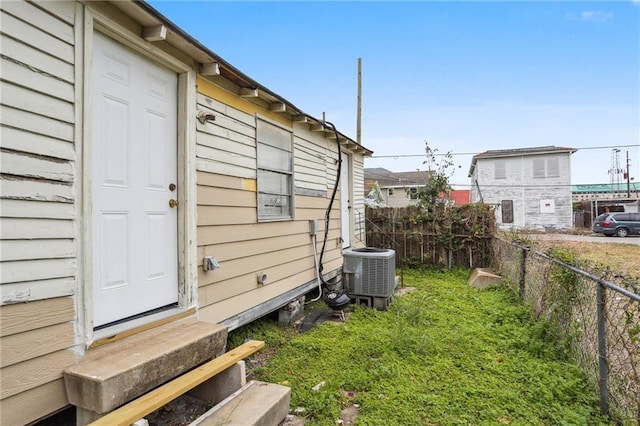 view of yard with central air condition unit