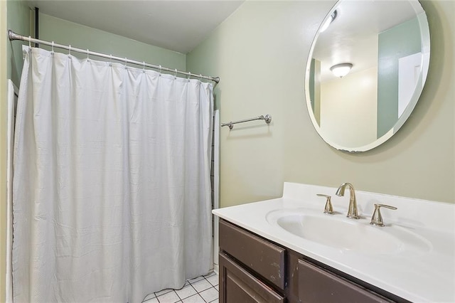 bathroom with vanity and tile patterned floors