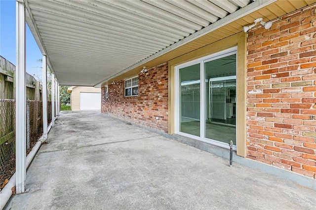 view of patio featuring a garage