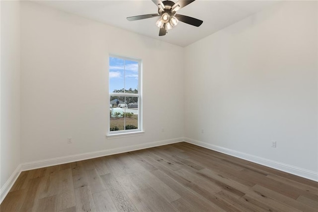 unfurnished room featuring ceiling fan and light wood-type flooring