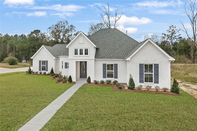 view of front facade with a front yard