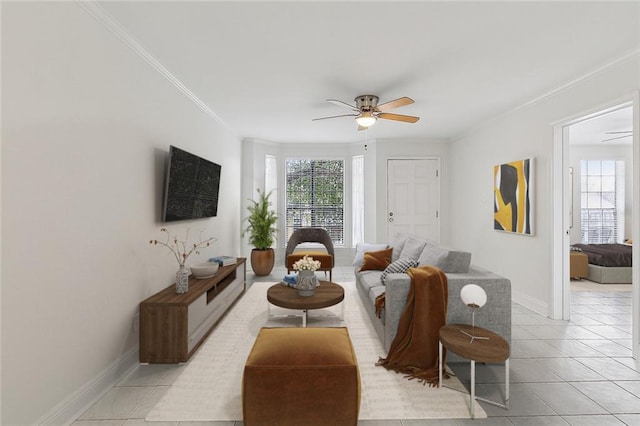 tiled living room featuring ceiling fan and crown molding