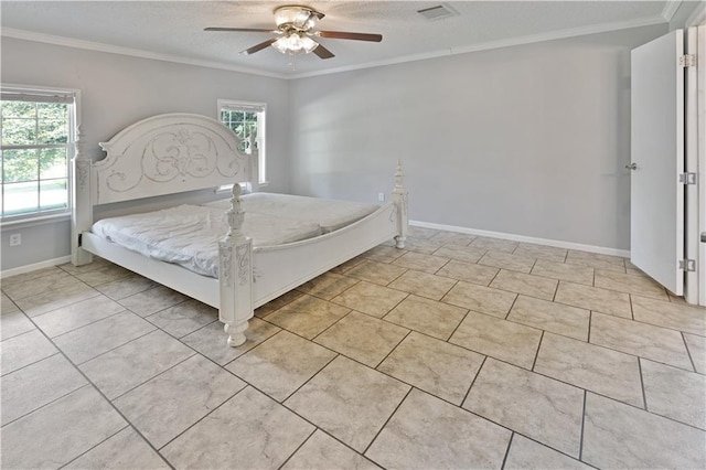 unfurnished bedroom featuring visible vents, baseboards, a textured ceiling, and ornamental molding