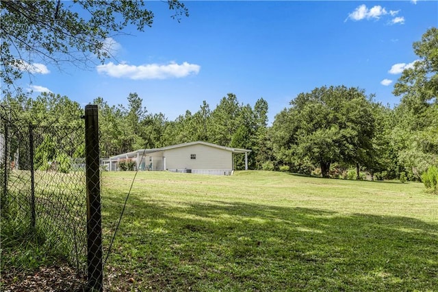 view of yard featuring fence