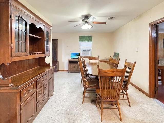 dining room featuring ceiling fan