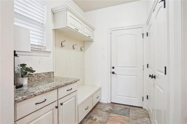 mudroom with a barn door