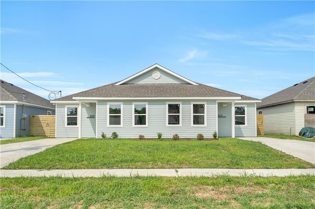 ranch-style house with a front lawn