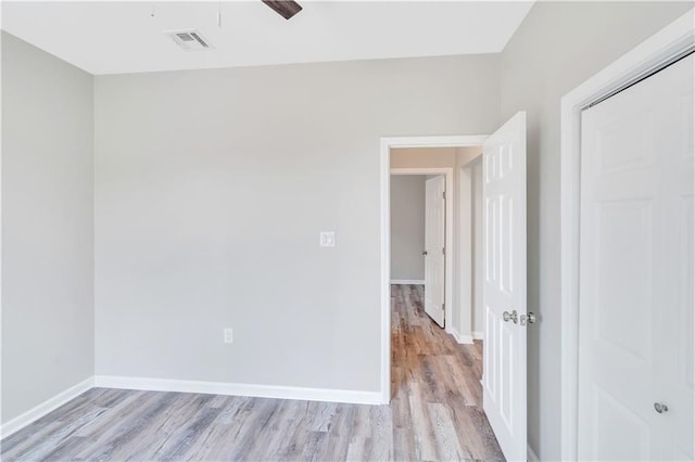 unfurnished room featuring light hardwood / wood-style floors