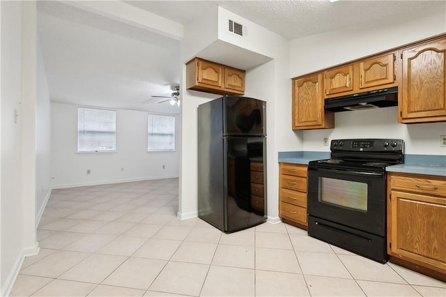 kitchen with ceiling fan, light tile patterned floors, and black appliances