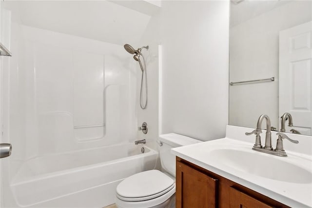 full bathroom featuring shower / bathing tub combination, vanity, and toilet