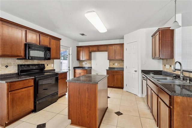 kitchen with black appliances, sink, light tile patterned floors, tasteful backsplash, and a kitchen island