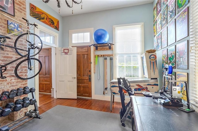 home office with wood-type flooring