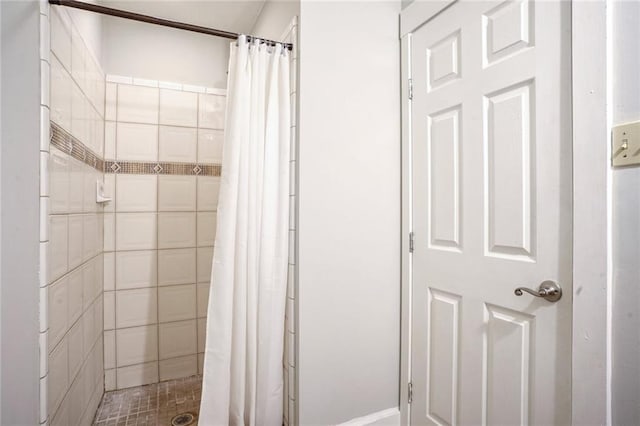 bathroom featuring walk in shower