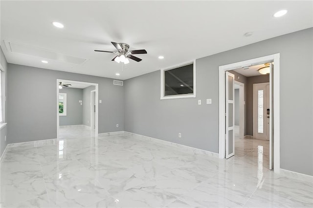 empty room featuring ceiling fan