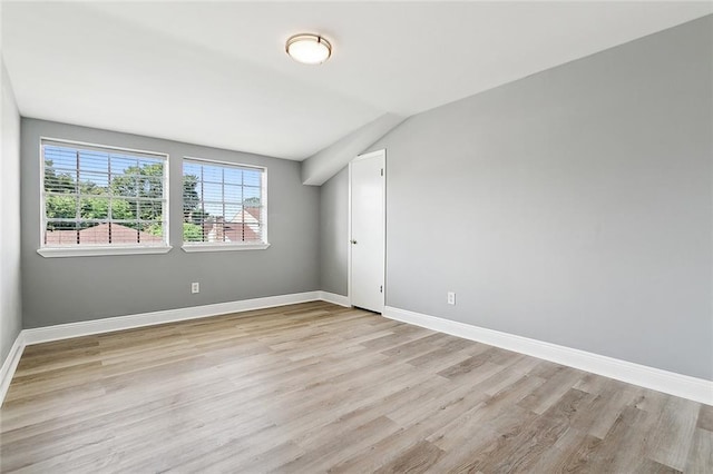 empty room with light wood-type flooring