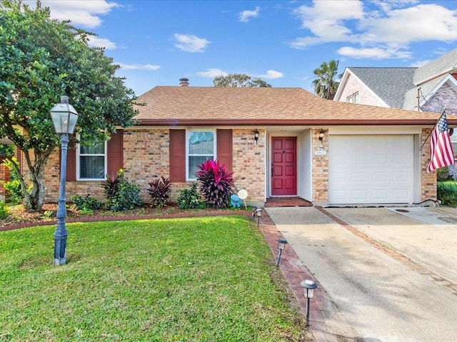 single story home with a garage and a front lawn