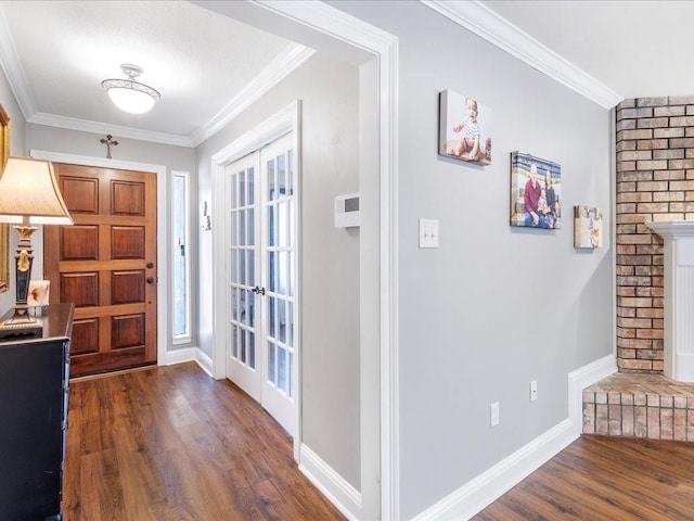 entrance foyer featuring dark hardwood / wood-style floors and ornamental molding