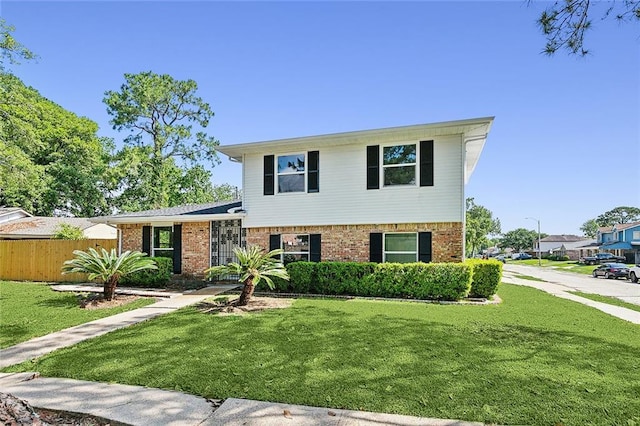 4128 Fiesta St, New Orleans, LA 70131 - tri-level home with a front lawn