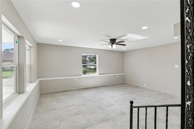 empty room featuring ceiling fan