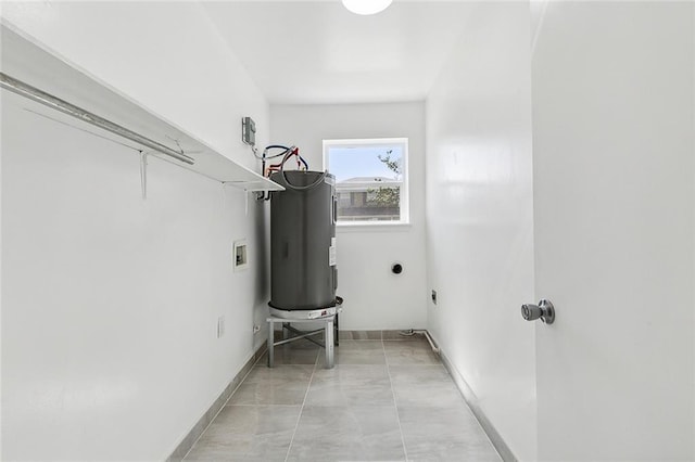 washroom with electric dryer hookup, electric water heater, and washer hookup