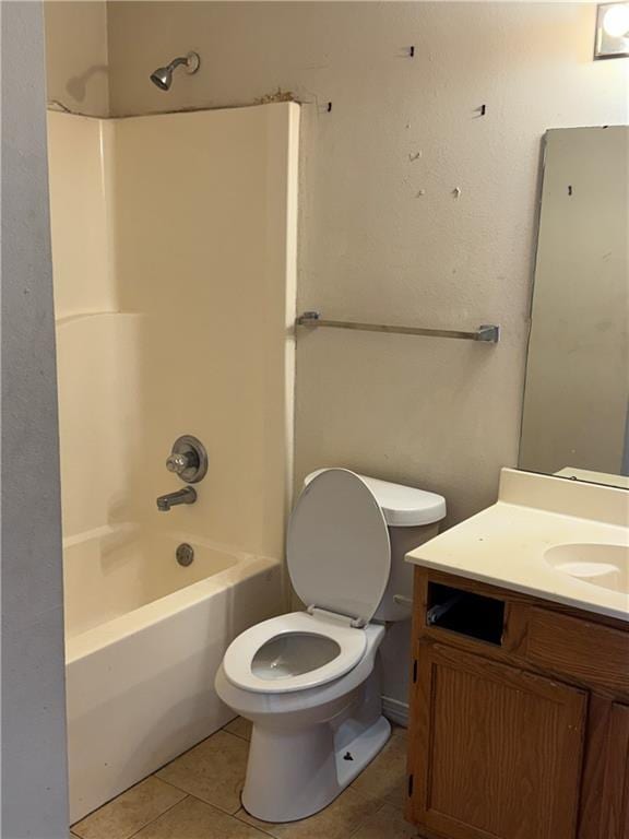 full bathroom with tile patterned floors, toilet, vanity, and tub / shower combination