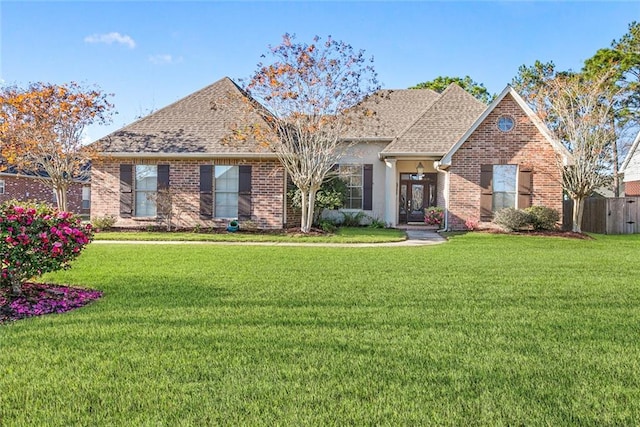 view of front of home with a front yard