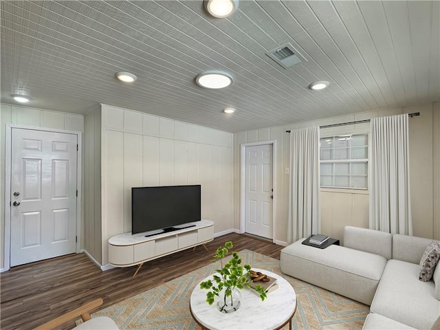 living room with dark hardwood / wood-style floors