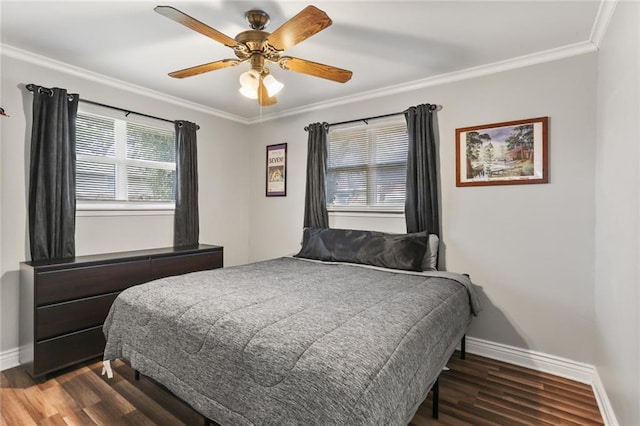 bedroom featuring ceiling fan, dark hardwood / wood-style flooring, and ornamental molding