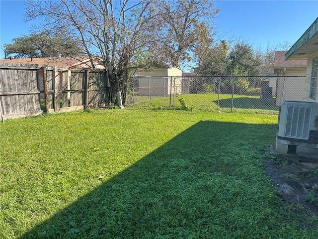 view of yard featuring central AC unit