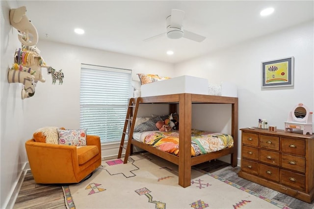 bedroom featuring light hardwood / wood-style floors and ceiling fan