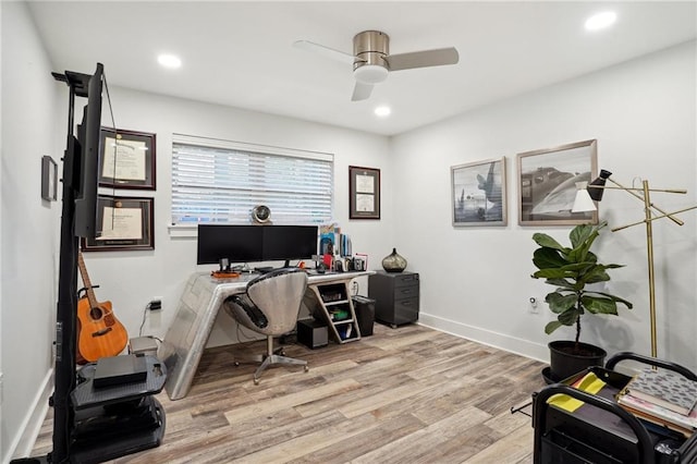 office featuring light hardwood / wood-style flooring and ceiling fan