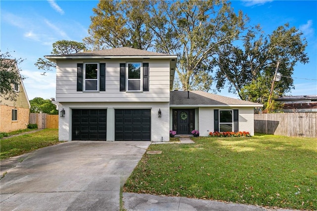 front of property with a garage and a front lawn