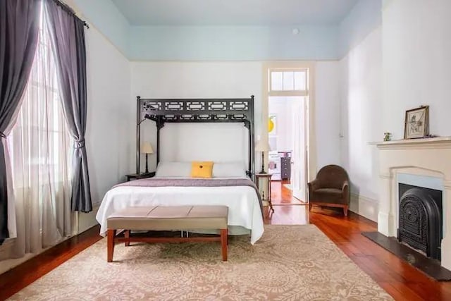 bedroom featuring hardwood / wood-style flooring