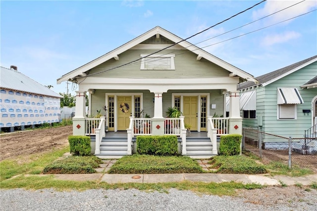 bungalow-style home featuring covered porch