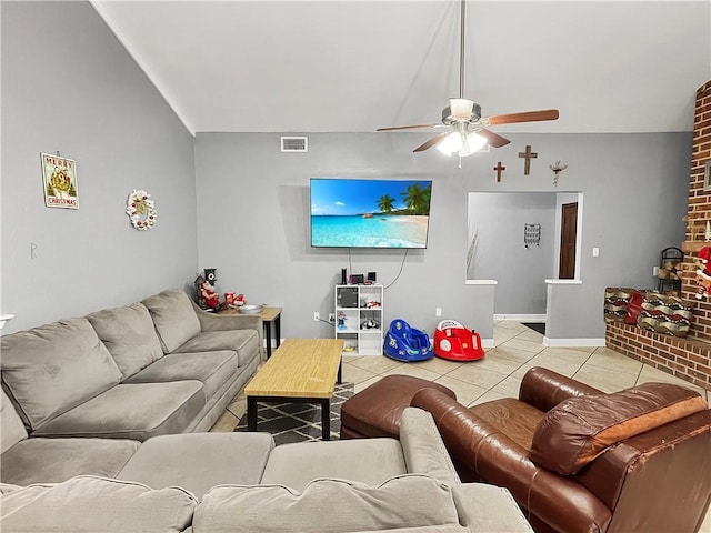 tiled living room with ceiling fan and lofted ceiling