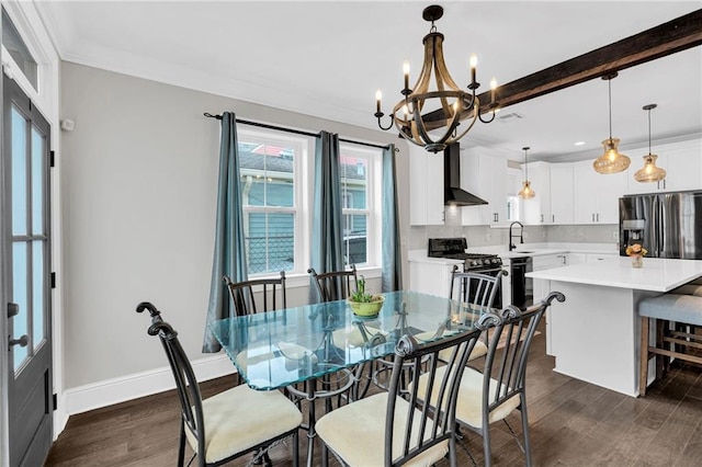 1508 N Roman St, New Orleans, LA 70116 - dining area with baseboards, a chandelier, crown molding, recessed lighting, and dark wood-type flooring