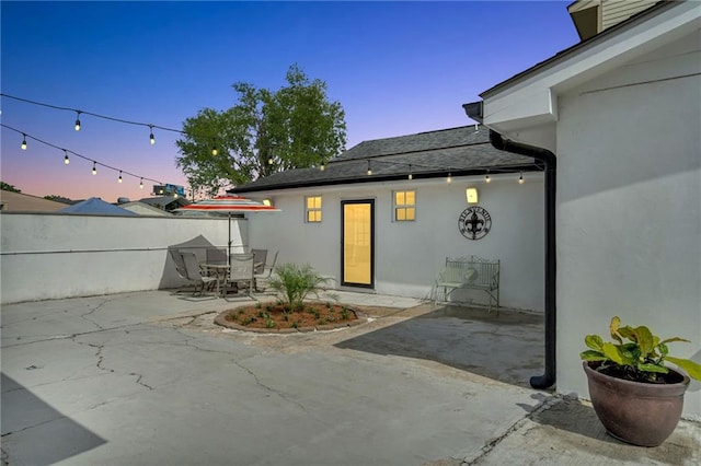 1508 N Roman St, New Orleans, LA 70116 - exterior space featuring outdoor dining space, fence, a patio, and stucco siding