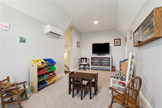 game room featuring lofted ceiling, an AC wall unit, and light carpet