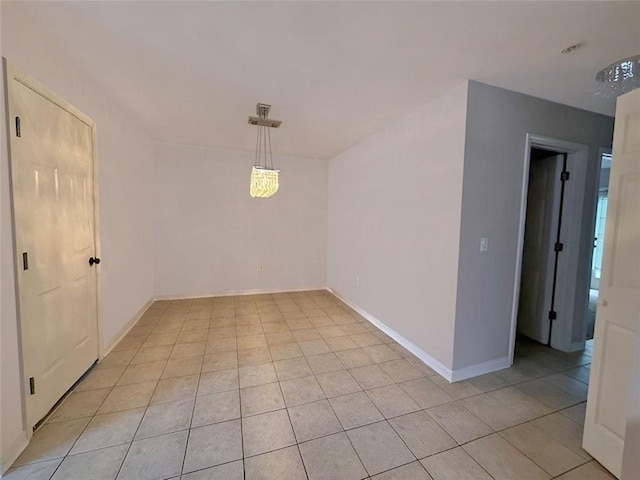 empty room featuring light tile patterned flooring