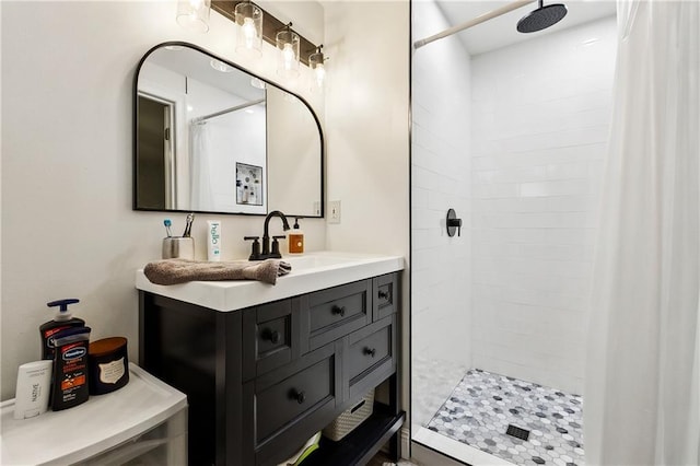 bathroom featuring vanity and walk in shower