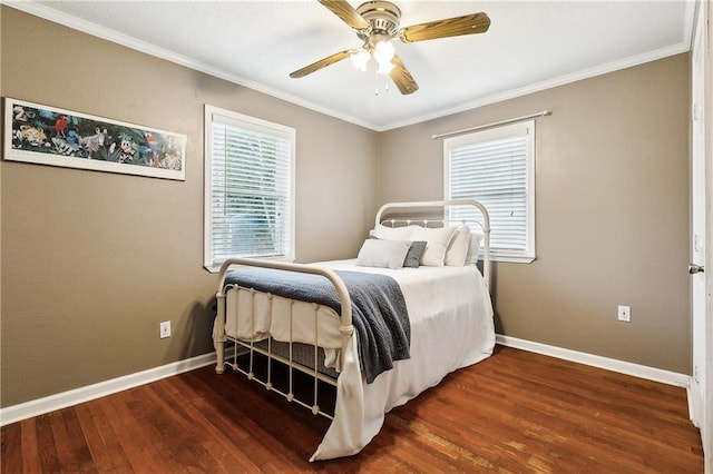 bedroom with ceiling fan, ornamental molding, and dark wood-type flooring