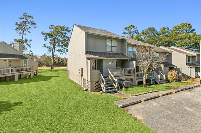 view of home's exterior with a yard