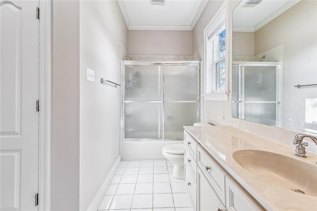 full bathroom with tile patterned floors, crown molding, toilet, shower / bath combination with glass door, and vanity