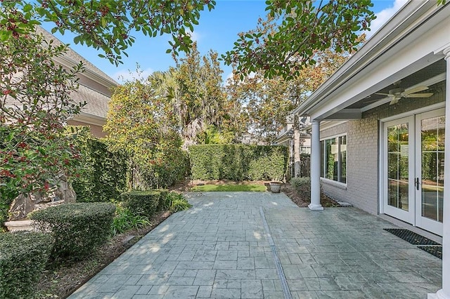 view of patio / terrace with french doors and ceiling fan