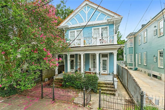 view of front of home with a balcony